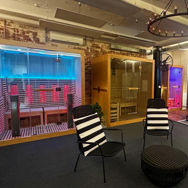 Relaxation lounge area adjacent to infrared sauna at Hammer House Essendon recovery facilities